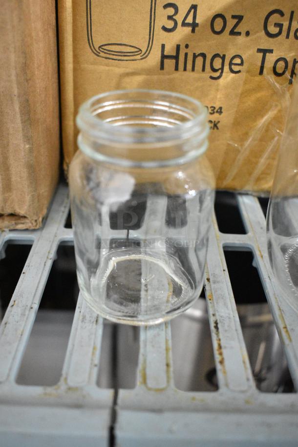 2  BRAND NEW SCRATCH AND DENT! Boxes Including 5537107 Acopa Rustic Charm 5 oz. Mini Mason Jar - 12/Case and 553100034 Choice 34 oz. Hinge Top Glass Storage Jar - 4/Pack. 2 Times Your Bid! - Image 2 of 8
