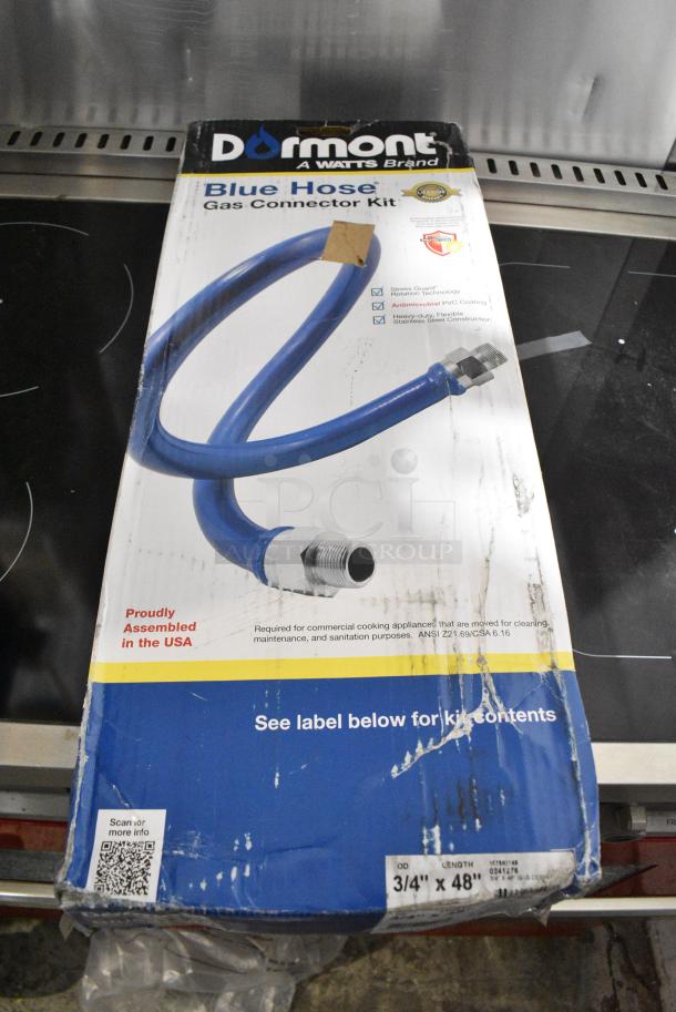 BRAND NEW SCRATCH AND DENT! Dormont 1675KIT48 Deluxe 48" Moveable Gas Connector Kit with SnapFast® Quick Disconnect, Two Elbows, and Restraining Cable - 3/4" Diameter - Image 1 of 4