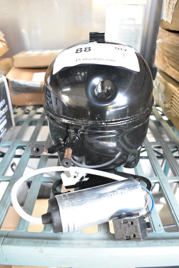 BRAND NEW SCRATCH AND DENT! Embraco EM2X3117U Compressor. 115-127 Volts, 1 Phase. - Image 2 of 4
