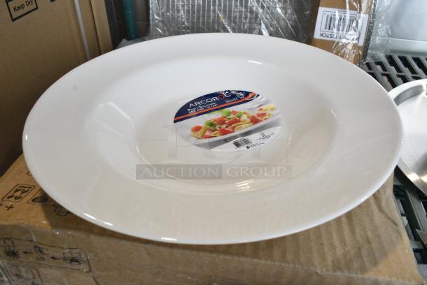 BRAND NEW SCRATCH AND DENT! Box of 12 Arcoroc N9405 Evolutions 11" White Round Opal Glass Pasta Plate by Arc Cardinal. - Image 1 of 6