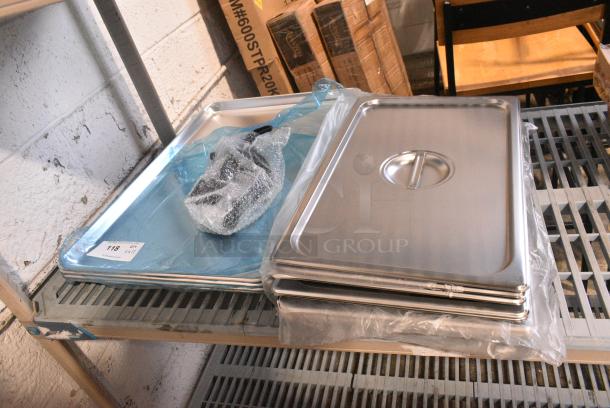 12 BRAND NEW SCRATCH AND DENT! Items Including 407BUNFULL Baker's Lane Full Size 18 Gauge Non-Stick 18" x 26" Black Wire in Rim Aluminum Bun / Sheet Pan / Tray, 4070110 Choice Full Size Stainless Steel Solid Steam Table / Hotel Pan Cover. 12 Times Your Bid! - Image 1 of 8