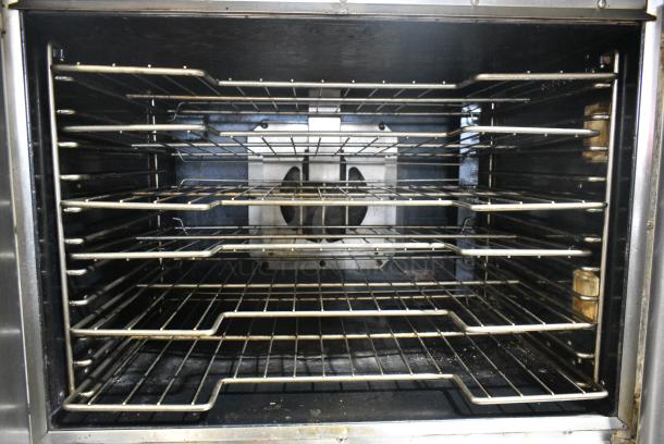 2 Vulcan VC4GD-11D150K Stainless Steel Commercial Natural Gas Powered Full Size Convection Oven w/ View Through Doors, Metal Oven Racks and Thermostatic Controls on Commercial Casters. 2 Times Your Bid! - Image 6 of 9