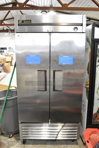 True T-35 Stainless Steel Commercial 2 Door Reach In Cooler on Commercial Casters. 115 Volts, 1 Phase. Tested and Working!
