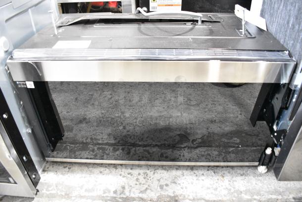 BRAND NEW SCRATCH AND DENT! 2024 Samsung ME21DG5700SRAA Microwave Oven. 120 Volts, 1 Phase. - Image 1 of 10
