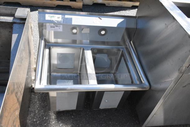 BRAND NEW SCRATCH AND DENT! Regency 600S2104 Stainless Steel Two Compartment Commercial Sink with Galvanized Steel Legs and without Drainboard - 10" x 14" x 12" Bowls. No Legs. - Image 1 of 5
