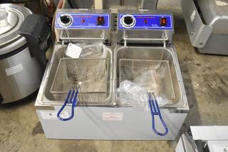 BRAND NEW SCRATCH AND DENT! Globe PF32E Stainless Steel Commercial Countertop Electric Powered 2 Bay Deep Fat Fryer w/ 2 Metal Fry Baskets. 208/240 Volts, 1 Phase.