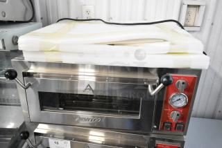 BRAND NEW SCRATCH AND DENT! 2024 Avantco 177DPO18S Stainless Steel Commercial Single Deck Countertop Pizza/Bakery Oven. 120 Volts, 1 Phase.