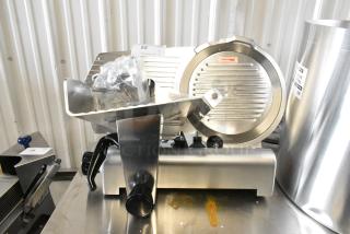 BRAND NEW SCRATCH AND DENT! Avantco 177SL312 Stainless Steel  12" Manual Gravity Feed Meat Slicer. 115 Volts, 1 Phase.