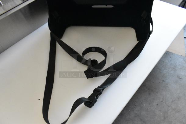 BRAND NEW SCRATCH AND DENT! Black Poly Countertop Booster Seat - Image 5 of 6