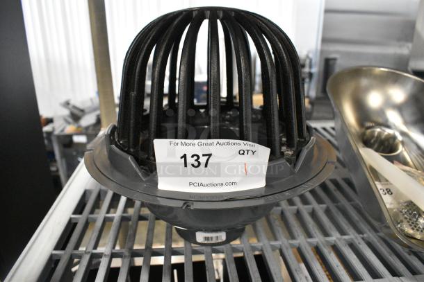 BRAND NEW SCRATCH AND DENT! Oatey 78023 3" - 4" PVC Roof Drain with Cast Iron Dome Guard - Image 1 of 5