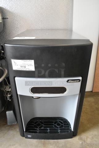 BRAND NEW SCRATCH AND DENT! Follett 15CI100A Chewblet Countertop Ice Maker and Water Dispenser with Filter - 15 lb. 115 Volts, 1 Phase. - Item #1184819
