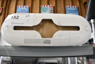 Tork White Poly Paper Towel Dispenser.
