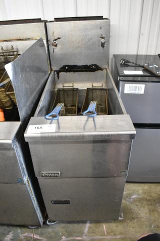 Pitco Frialator SG14 Stainless Steel Commercial Floor Style Natural Gas Powered Deep Fat Fryer w/ 2 Metal Fry Baskets on Commercial Casters. 110,000 BTU.