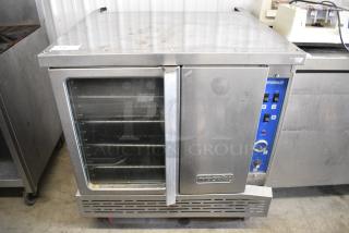 Imperial Stainless Steel Commercial Electric Powered Full Size Convection Oven w/ View Through Door, Solid Door, Metal Oven Racks and Thermostatic Controls on Commercial Casters. 208 Volts, 3 Phase.