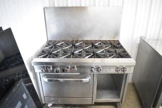 Southbend S481DC Stainless Steel Commercial Natural Gas Powered 8 Burner Range w/ Oven and Back Splash on Commercial Casters.