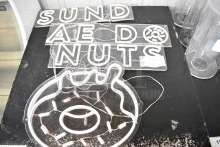 4 Various Neon Light Up Sign Including Donut, Sund, Ae Do, Nuts. 4 Times Your Bid! Buyer Must Pick Up - We Will Not Ship This Item.
