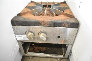 Cooking Performance Group Stainless Steel Commercial Natural Gas Powered Single Burner Stock Pot Range.