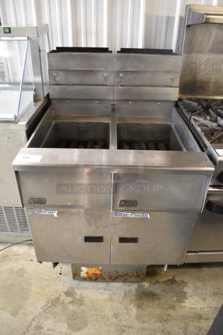 Pitco Frialator SSH55 Stainless Steel Commercial Floor Style Natural Gas Powered Deep Fat Fryer w/ Filtration System on Commercial Casters. 80,000 BTU.