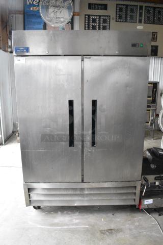 Arctic Air AF49 Stainless Steel Commercial 2 Door Reach In Freezer on Commercial Casters. 115 Volts, 1 Phase.