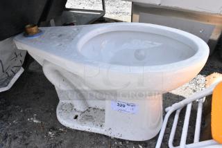 BRAND NEW SCRATCH AND DENT! Zurn Toilet. No Tank.
