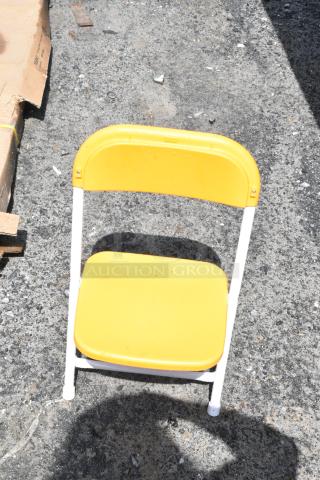 2 BRAND NEW SCRATCH AND DENT! Yellow Poly Folding Chair. 2 Times Your Bid!