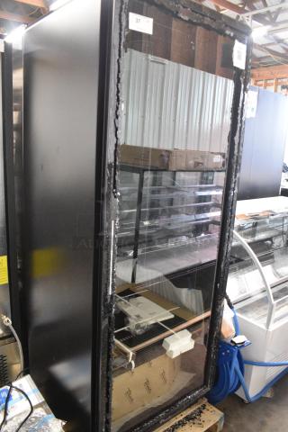 BRAND NEW SCRATCH AND DENT! 2025 True CVM-27-HC 30" Black Refrigerated Contemporary Glass Door Merchandiser with LED Lighting - 78 1/2" Tall. See Pictures for Glass Damage. 115 Volts, 1 Phase. Tested and Working!