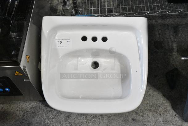 BRAND NEW SCRATCH AND DENT! Zurn Z5844 Ceramic Single Bay Wall Mount Sink. - Image 1 of 6