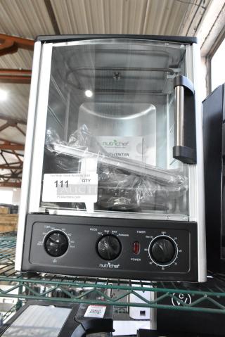 NutriChef AZPKRT97 Metal Countertop Vertical Rotisserie Oven. 120 Volts, 1 Phase.