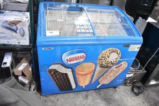 AHT RIO S 100 Metal Commercial Chest Freezer Merchandiser on Commercial Casters. 115 Volts, 1 Phase. Tested and Working!