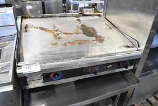 Star 636 Stainless Steel Commercial Countertop Natural Gas Powered Flat Top Griddle. 20,000 BTU.
