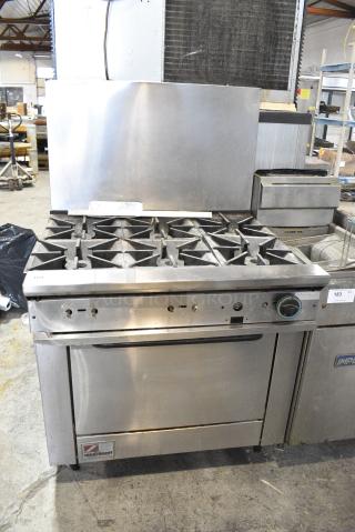 Southbend X436D Stainless Steel Commercial Natural Gas Powered 6 Burner Range w/ Oven and Back Splash.