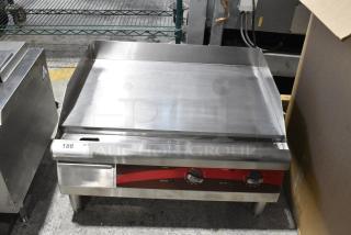 BRAND NEW SCRATCH AND DENT! Avantco 177EG24N Stainless Steel Commercial Countertop Electric Powered Flat Top Griddle. 208/240 Volts, 1 Phase.
