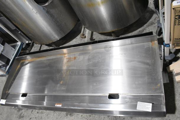 BRAND NEW SCRATCH AND DENT! 2024 Cooking Performance Group 351GTCPG72NL Stainless Steel 72" Natural Gas Countertop Griddle with Thermostatic Controls - 180,000 BTU. - Image 7 of 9