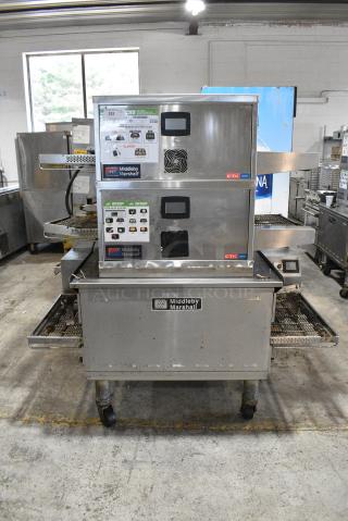 3 Middleby Marshall Stainless Steel Commercial Conveyor Pizza Ovens on Commercial Casters. Includes Models DZ33T. 208 Volts, 3/1 Phase. 3 Times Your Bid! - Item #1182118