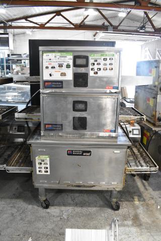 3 Middleby Marshall Stainless Steel Commercial Conveyor Pizza Ovens on Commercial Casters. Includes Models DZ33T. 208 Volts, 3/1 Phase. 3 Times Your Bid! - Item #1182119