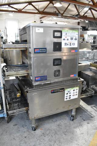 3 Middleby Marshall Stainless Steel Commercial Conveyor Pizza Ovens on Commercial Casters. Includes Models DZ33T. 208 Volts, 3/1 Phase. 3 Times Your Bid! - Item #1182121