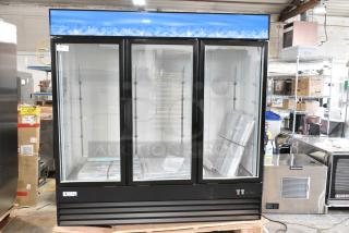 BRAND NEW SCRATCH AND DENT! 2024 Avantco 178GDC69HCB 78 1/4" Black Customizable Swing Glass Door Merchandiser Refrigerator with LED Lighting. 115 Volts, 1 Phase. Tested and Working!