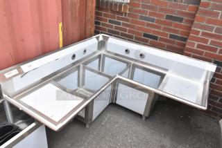 BRAND NEW SCRATCH AND DENT! Regency 600S31818C Stainless Steel 3 Bay L Shaped Sink w/ Dual Drain Boards. No Legs.