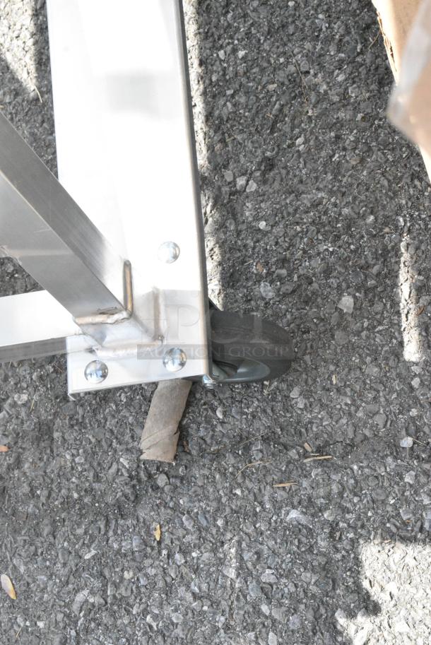 BRAND NEW SCRATCH AND DENT! Metal #10 Can Rack on Commercial Casters. - Image 3 of 4