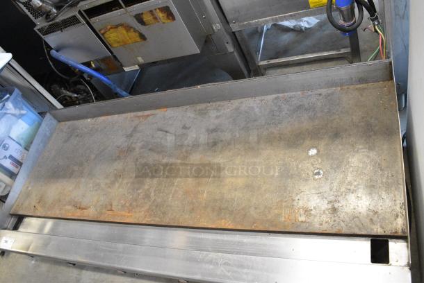 Vulcan Stainless Steel Commercial Countertop Natural Gas Powered Flat Top Griddle w/ Thermostatic Controls. - Image 6 of 7