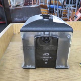 Tork Xpressnap Cafe Napkin Dispenser. 3XBID