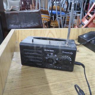 One Dreamsky AM/FM Radio. - Item #1182603
