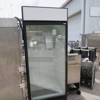 One Beverage Air 1 Door Glass Display Cooler With 3 Racks. Model# MT27. 115 Volt. Working NOT COLD. 29.5X32X80