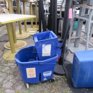 One Mop Bucket And Wringer.