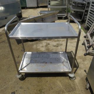 One Stainless Steel 2 Shelf Cart on Casters. 34X21X36