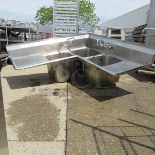 One Stainless Steel 3 Compartment Corner Sink With 2 Faucets And  R/L Drain Boards. No Legs. 56X25. 58.5X5.