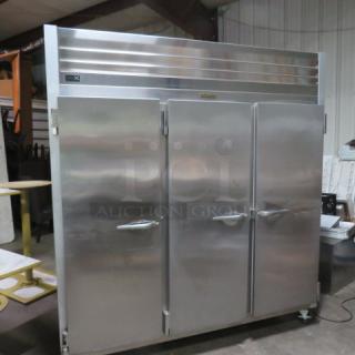 One WORKING Traulsen 3 Door Stainless Steel Cooler With 9 Racks, On Casters. Model# G30011. 115 Volt. 76X34X83.5. $8765.32