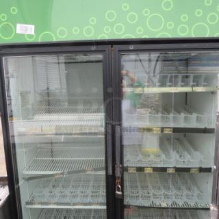 One True Pass Thru 2 Door Glass Display Cooler With 10 Racks And Soda Racking. Model# GDM-52TM-RL-LD. 115 Volt. 54X32X78.