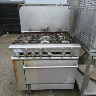 One DCS 6 Burner Natural Gas Range On Casters. Model# 36-6-1H. 36X30X55.5