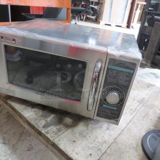 One NEW Sharp Microwave . Model# R021LC. 1000 Watt.